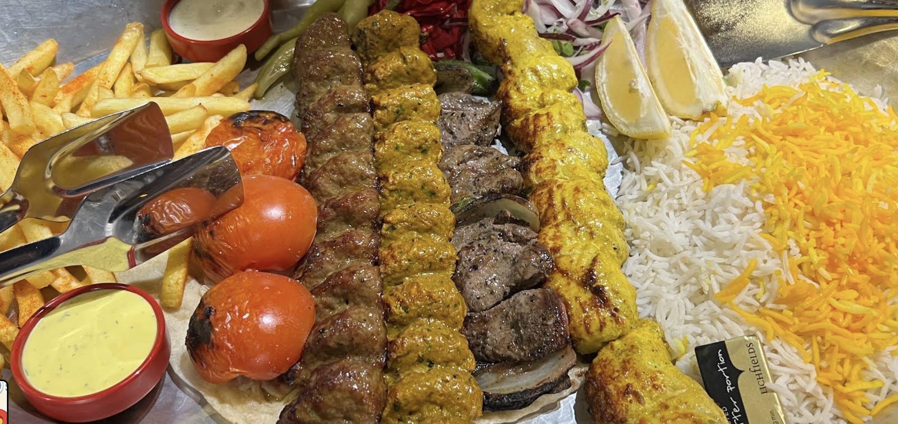 Mixed charcoal grill with saffron rice